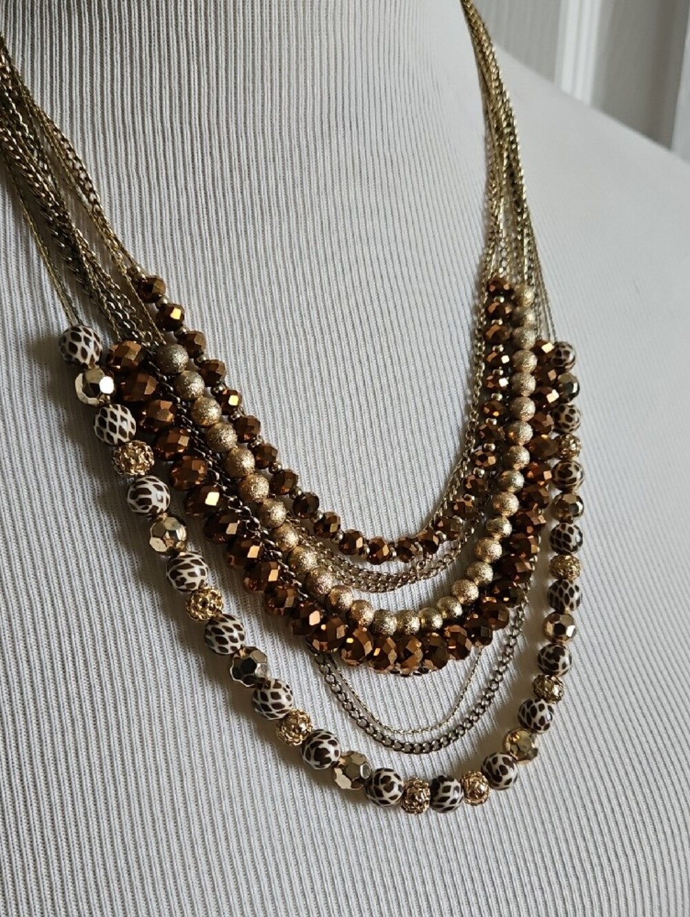 Layered Gold and Bronze Multi-Strand Beaded Necklace